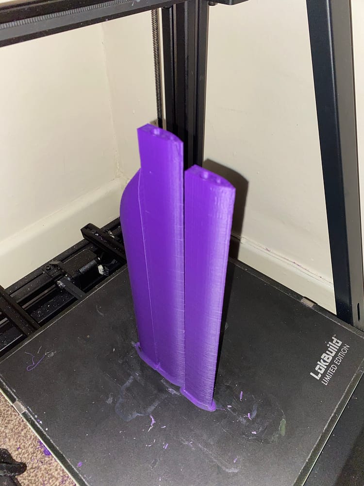 Three sections of the blade printed on the printer bed.