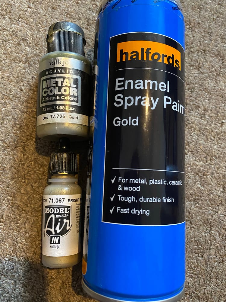 The three gold paints I'll be using, one spray, two airbrush