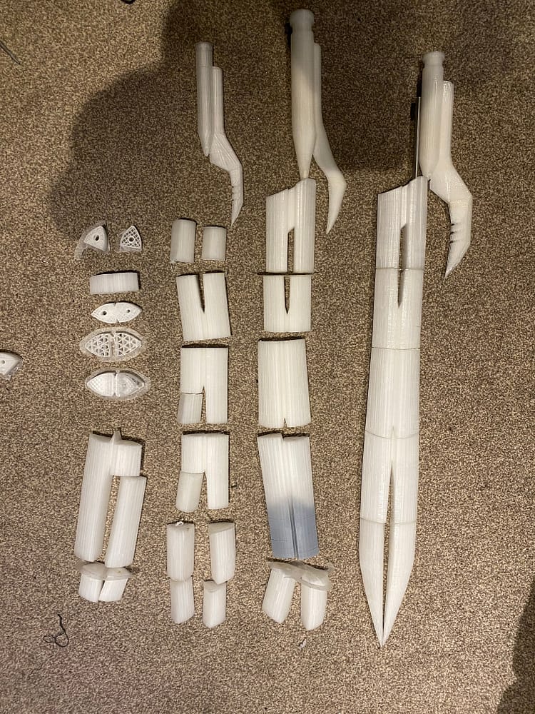 Final print on the right, with nearly three full swords worth of failure to the left.