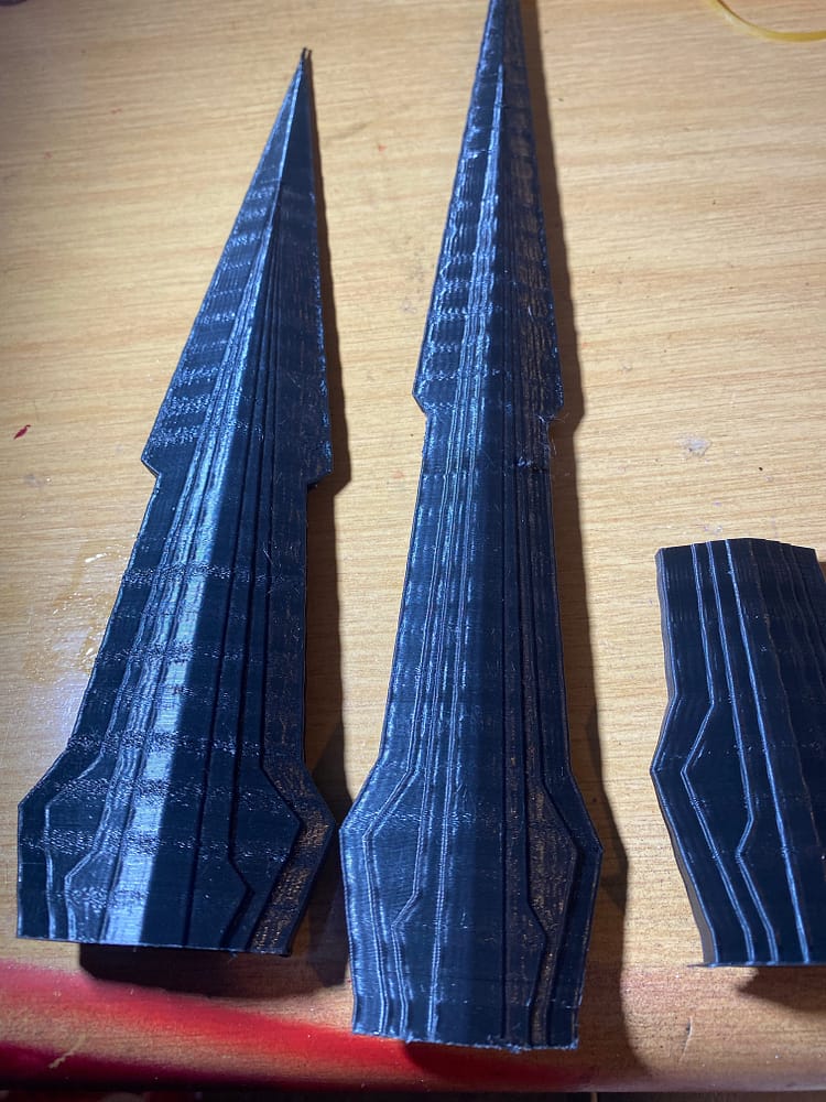 Mutliple bklades showing off the z banding issue with my printer.
