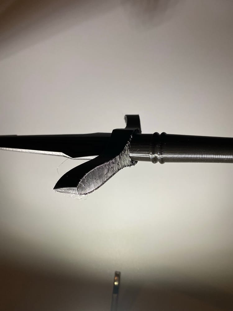Underside of hilt of loki dagger in black pla