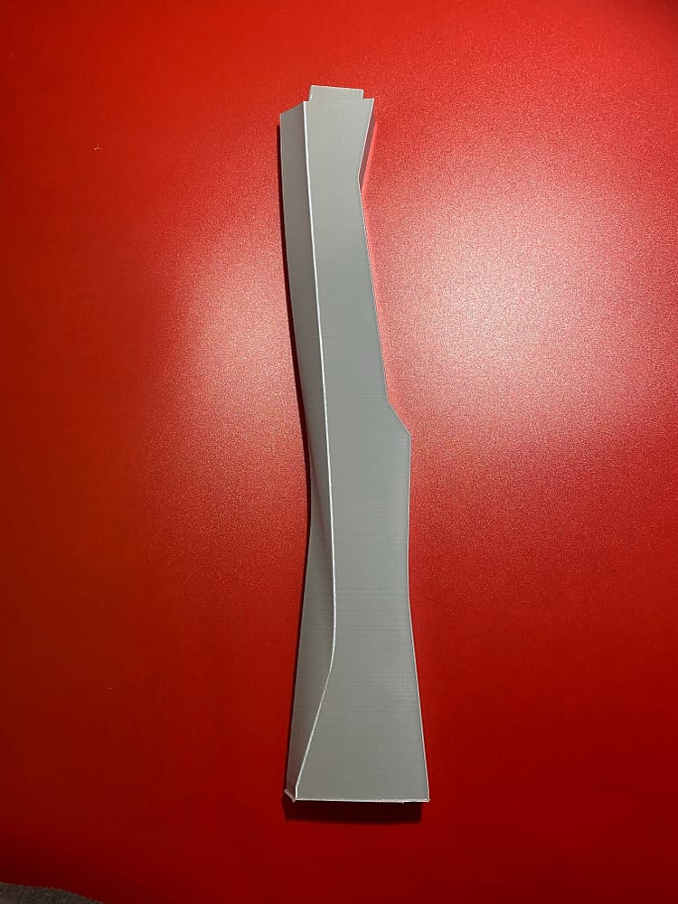 Tidus Longsword Component in grewy PLA with a red background: Blade 1