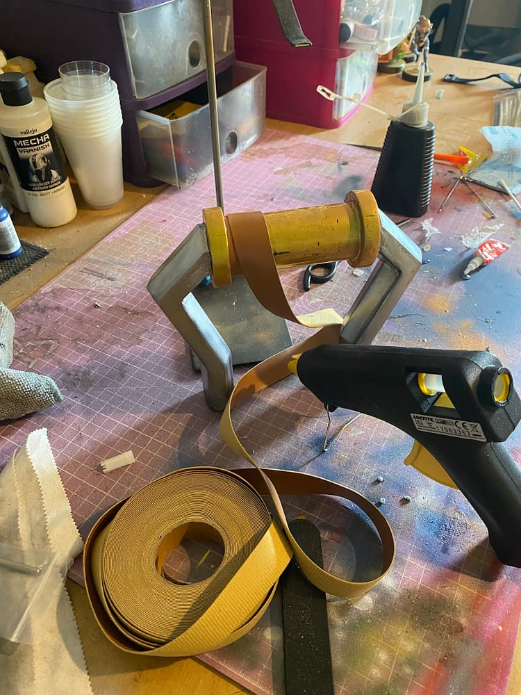 The hookshot handle is having the leather wrap for the handle glued on with a glue gun