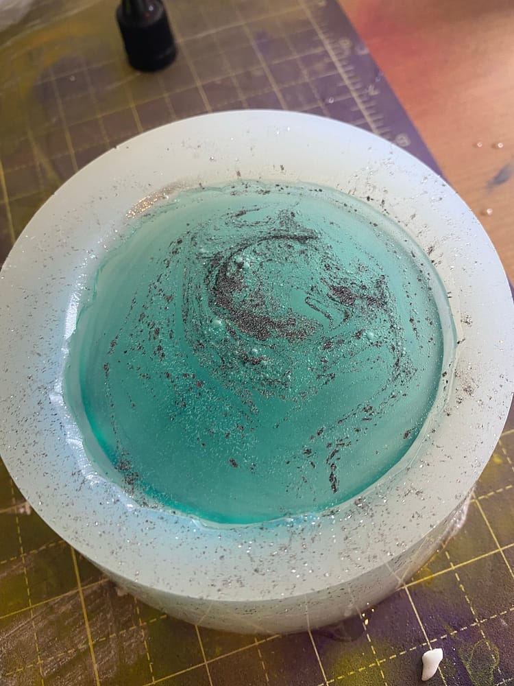 Mica powder mixed in with resin for the dome in light blue