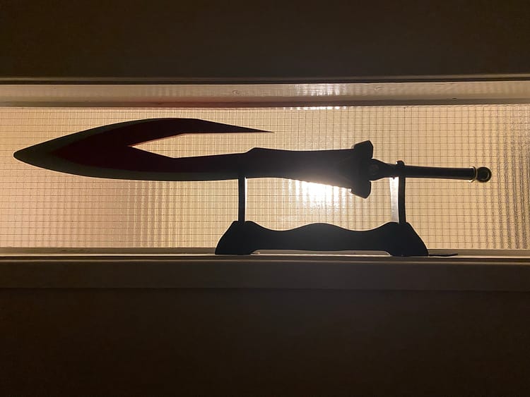 Backlit image of the final sword.