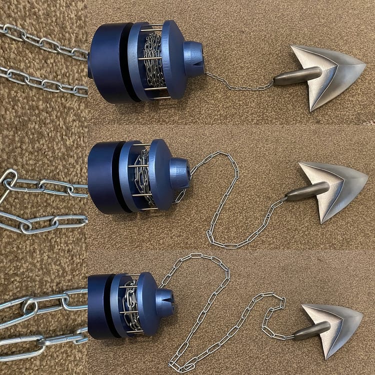 Hookshot body and arrow head with three different sized chains.